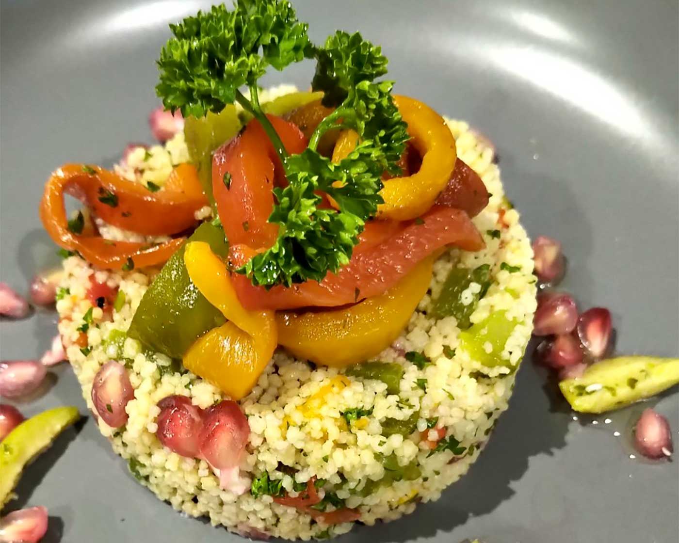 Couscous Salad with Roasted Pimento, Olive, and Pomegranate